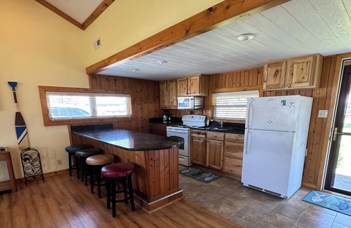 Port Clinton Cottage | Cozy Waterfront Cottage with a double lot— 4 miles to downtown Port Clinton