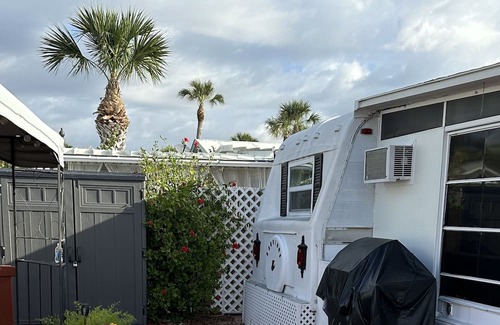 Punta Gorda House | Punta Gorda Mobil home w/enclosed lanai Steps from pool/club house. Dog friendly