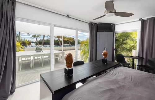 Rock Harbor Villa | Modern ocean side estate: 5 bed - 6 bath, big pool, 2 rooftops, small dock