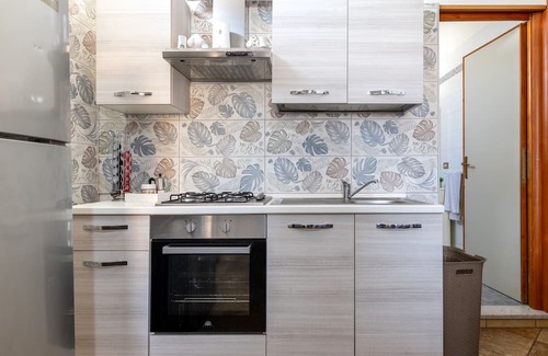 Torre Ovo Apartment | Apartment 'Casa Vacanze Le Barche Due' with Private Terrace and Air Conditioning