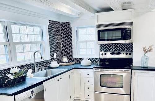 Hamilton House | Historic gem in the heart of downtown Hamilton! Trees and a private stream