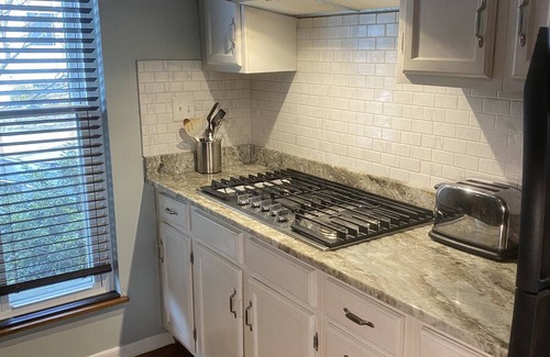 CUF Condo | Two-Story Luxurious Condo with Deck and Amazing City Views Close to the Action