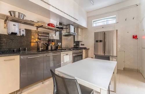Arsenal Apartment | A Verdant Escape:580m2:Expansive Townhouse Nestled in a Marais Cul-de-Sac