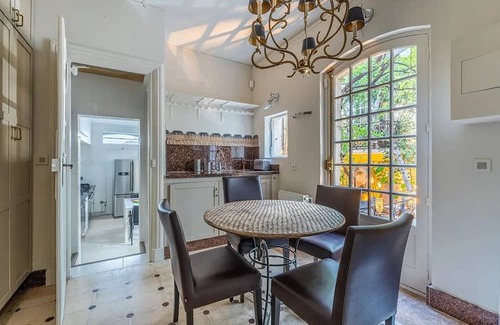 Arsenal Apartment | A Verdant Escape:580m2:Expansive Townhouse Nestled in a Marais Cul-de-Sac