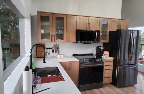 Marshland Cabin | Secluded Modern Cabin with Bluff Views, Hot Tub, Fire Pit.