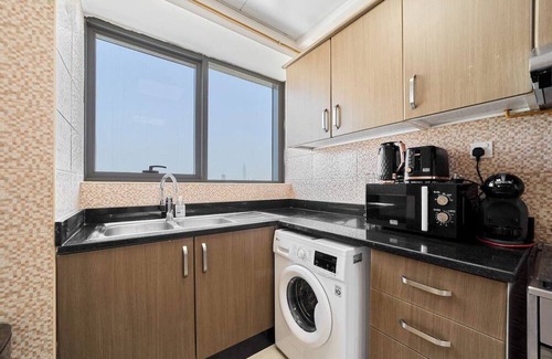 Dubai Production City Apartment | Modern 2BR in Ikarus Tower, Dubai Production City