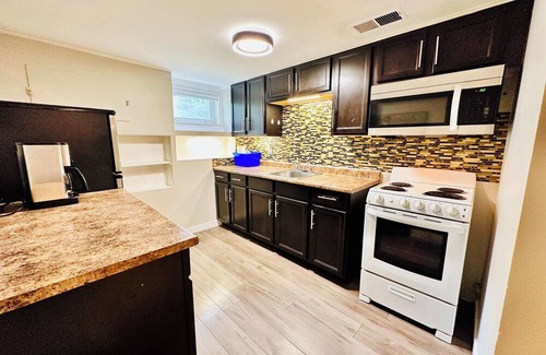 Winnipeg Apartment | Urban Nest in Beautiful St Boniface. Simple. Bright. Clean. Walkable. Amenities.