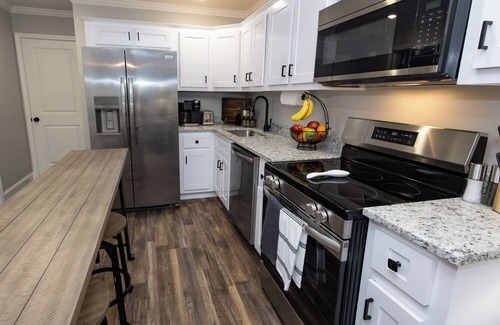 Peach Orchard Condo | Pines at Five Furnished Corporate Rentals