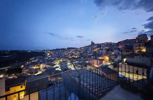 Caltagirone Apartment | An elegant retreat overlooking the city of mosaics