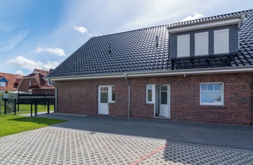 Westeraccumersiel Apartment | Experience happy times - live centrally, enjoy peace and quiet