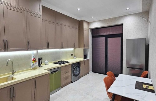 Nasimi Apartment | Charming Apartment with Side Sea View, Steps from the Metro