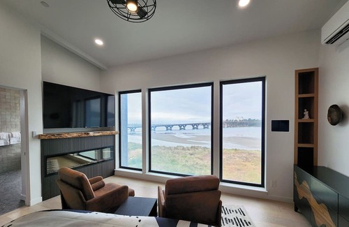 Waldport House | Spectacular Bridge and Bay Views! Bayfront, Hot Tub, Dog Friendly, Fireplace!