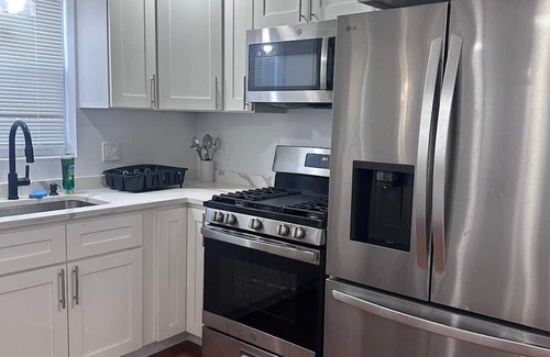 Upper South Providence Apartment | Simply Modern Getaway