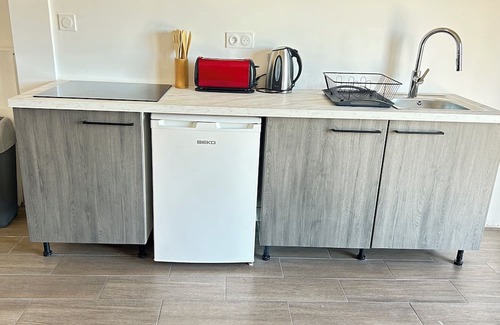 Tourette-du-Chateau House | Water lilies nestled in a haven of tranquillity.