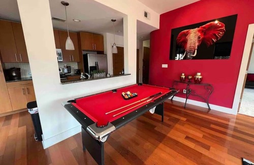 Loring Heights Apartment | The Red Room - Cloud Ceilings - Patio & Bathroom TV