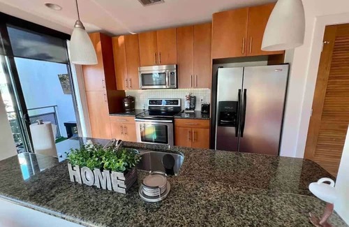 Loring Heights Apartment | The Red Room - Cloud Ceilings - Patio & Bathroom TV