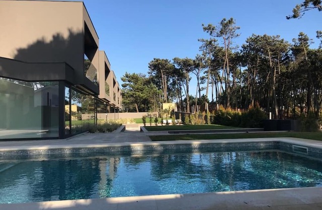 Charming two bedroom family friendly Villa next to the beach with exterior pool