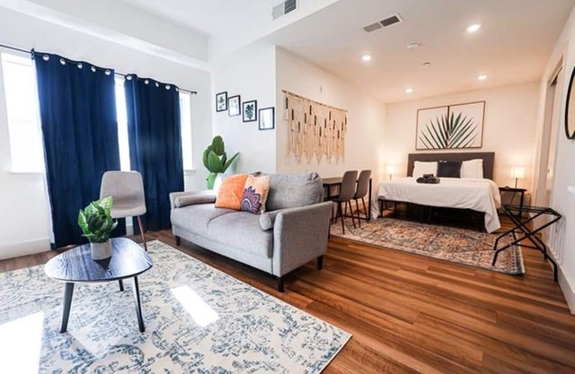 Imagine a stylish escape in Glenwood, the epitome of urban luxury