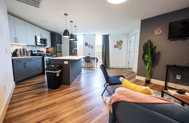 Imagine a stylish escape in Glenwood, the epitome of urban luxury