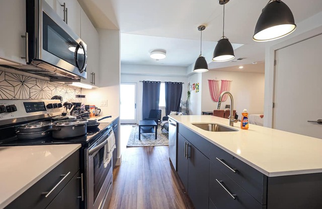 Imagine a stylish escape in Glenwood, the epitome of urban luxury