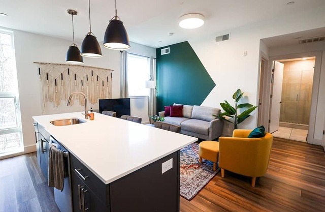 Imagine a stylish escape in Glenwood, the epitome of urban luxury