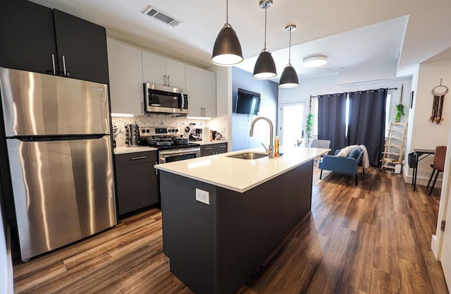 Imagine a stylish escape in Glenwood, the epitome of urban luxury