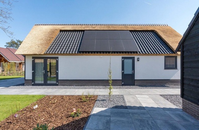 Thatched bungalow with private terrace