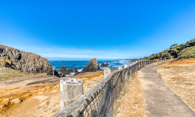 Tillicum Beach Cottage | Quaint cottage in the woods 75 yards to the beach - dog-friendly, firepit & WiFi