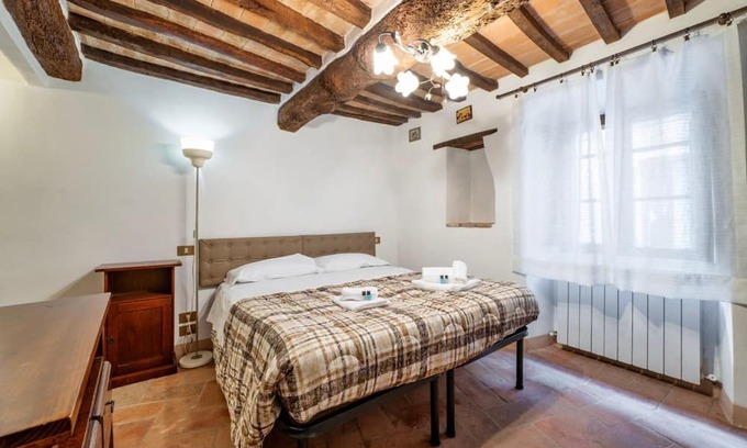 Bagnaia Apartment | Comfortable apartment of approximately 45 square meters, perfect for a stay of two, located on the ground floor of a period building (accessible via a few steps).The property is located in Bagnaia, a quiet hamlet a few kilometers from Perugia, surrounded