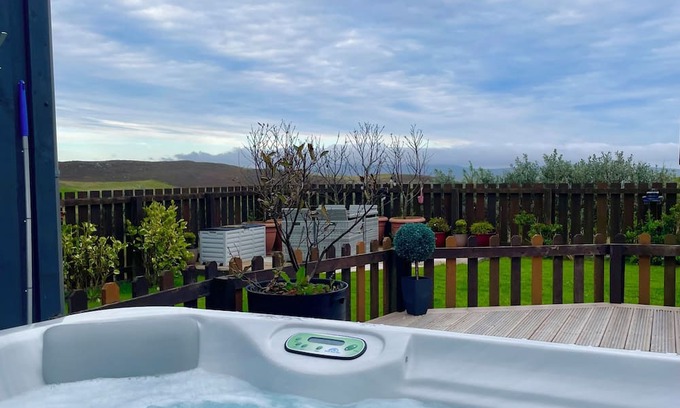 Stromness House | Switha- 3 bed home in Orkney, Scotland with hot tub and outstanding sea views